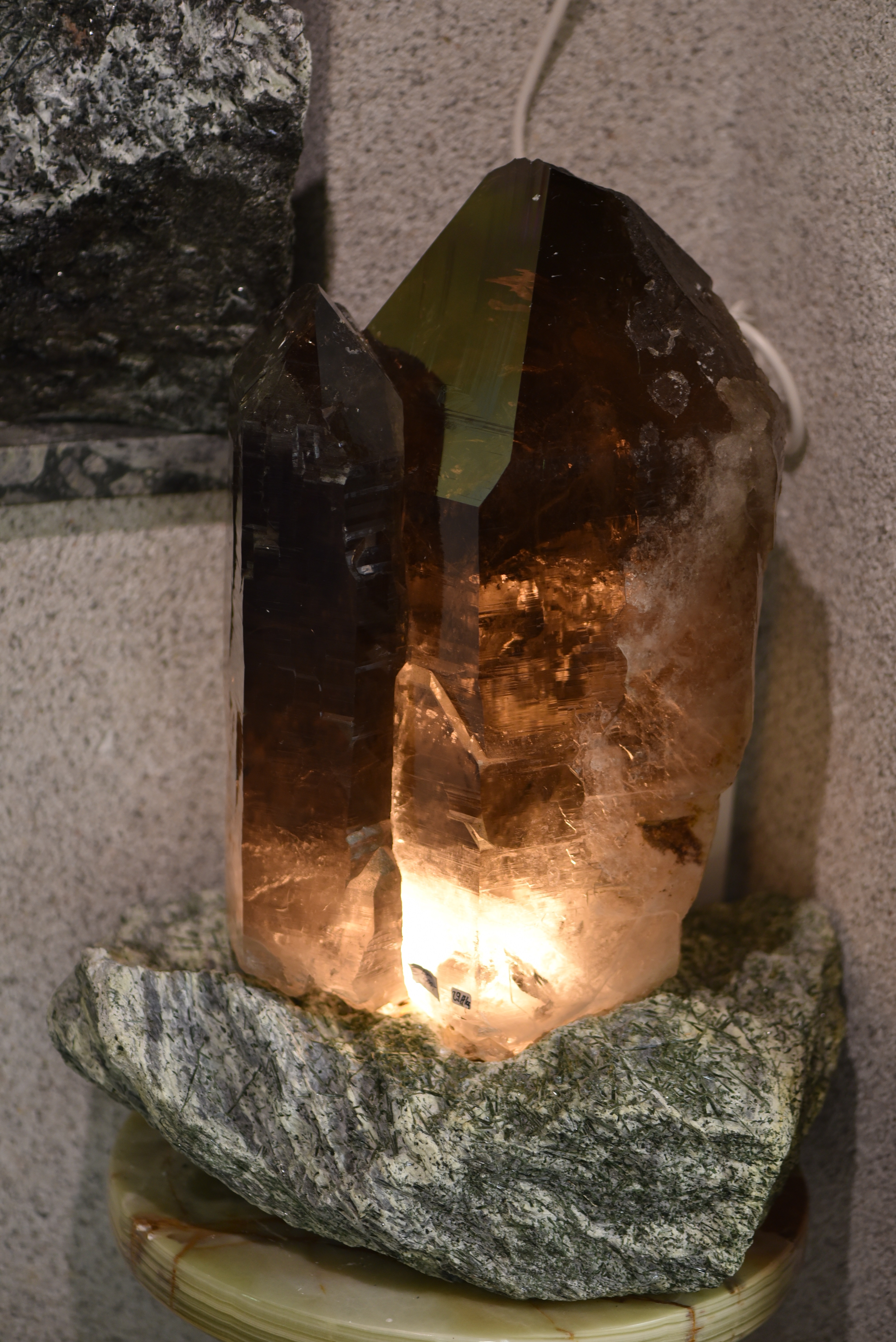 Smoky quartz with actinolite base